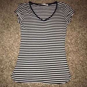 navy and white striped v-neck shirt